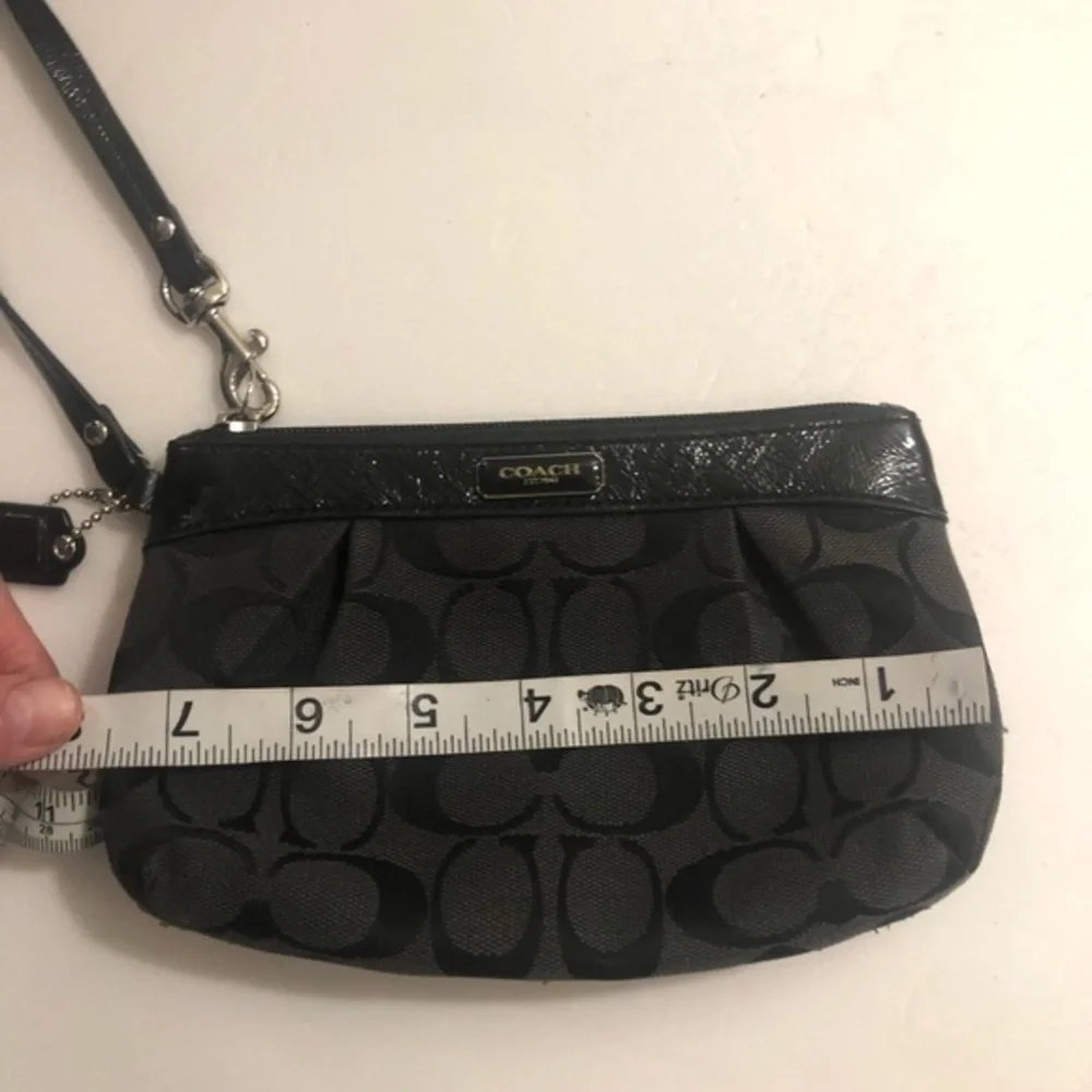 Coach black signature wristlet
